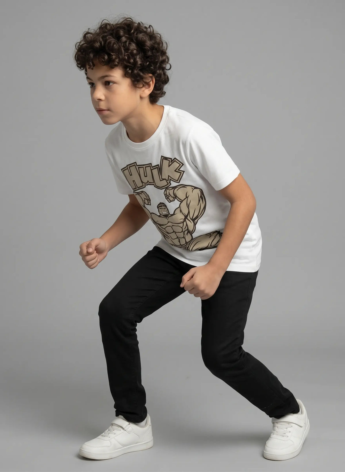 Hulk Superhero Kids T-Shirt shown in an active action pose with bold graphic print