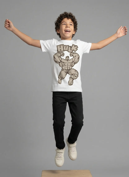 Kid wearing Hulk Superhero graphic T-Shirt in an active jumping pose