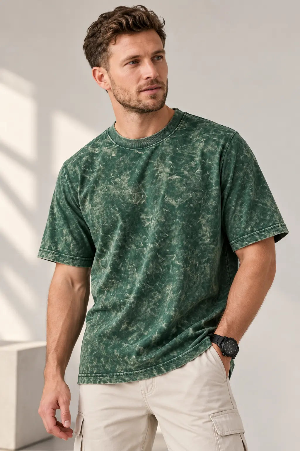 Men's forest green acid wash oversized t-shirt with ribbed crew neck, styled with beige cargo pants